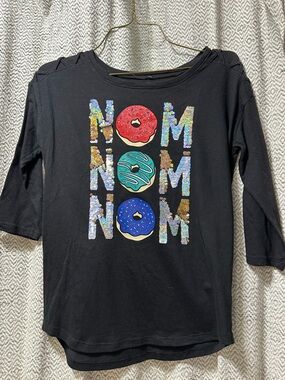 Justice Black Long Sleeve Tee with Colorful Sequin Donut 'NOM' Graphic